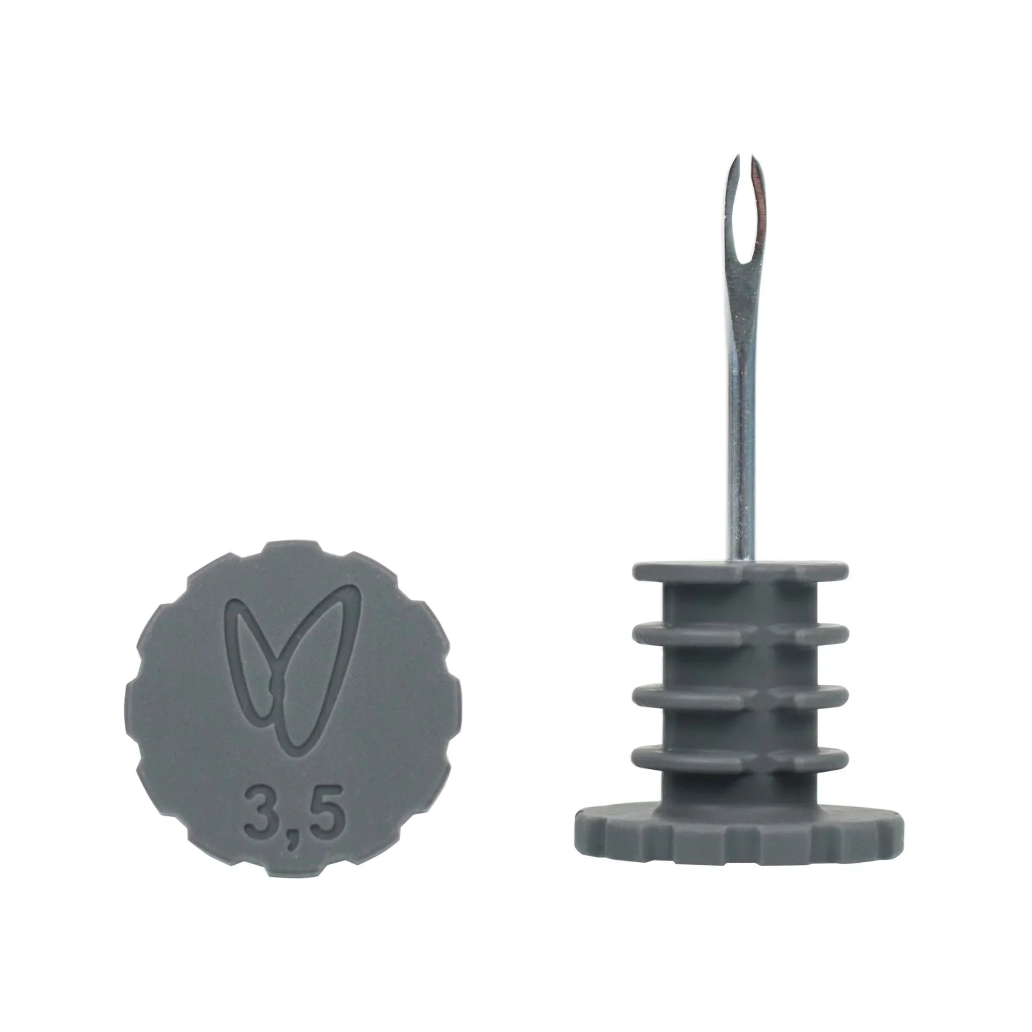 Tubeless tire plug tool with grey cap and forked metal tip for bicycle puncture repair