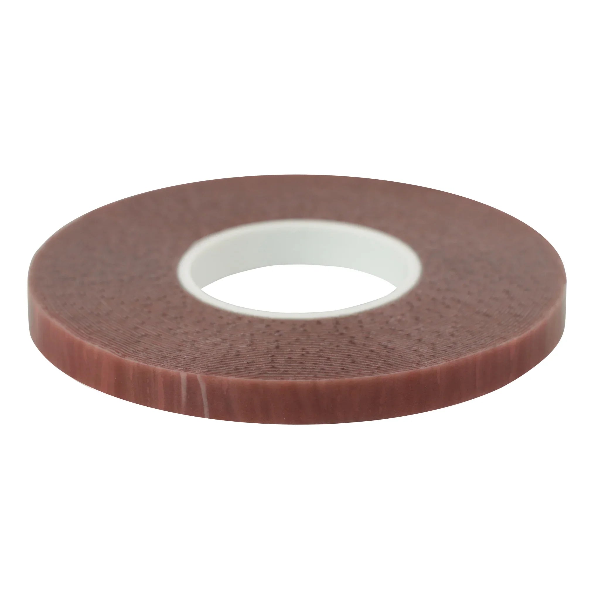 Thin brown bicycle rim tape roll with white inner core on white background