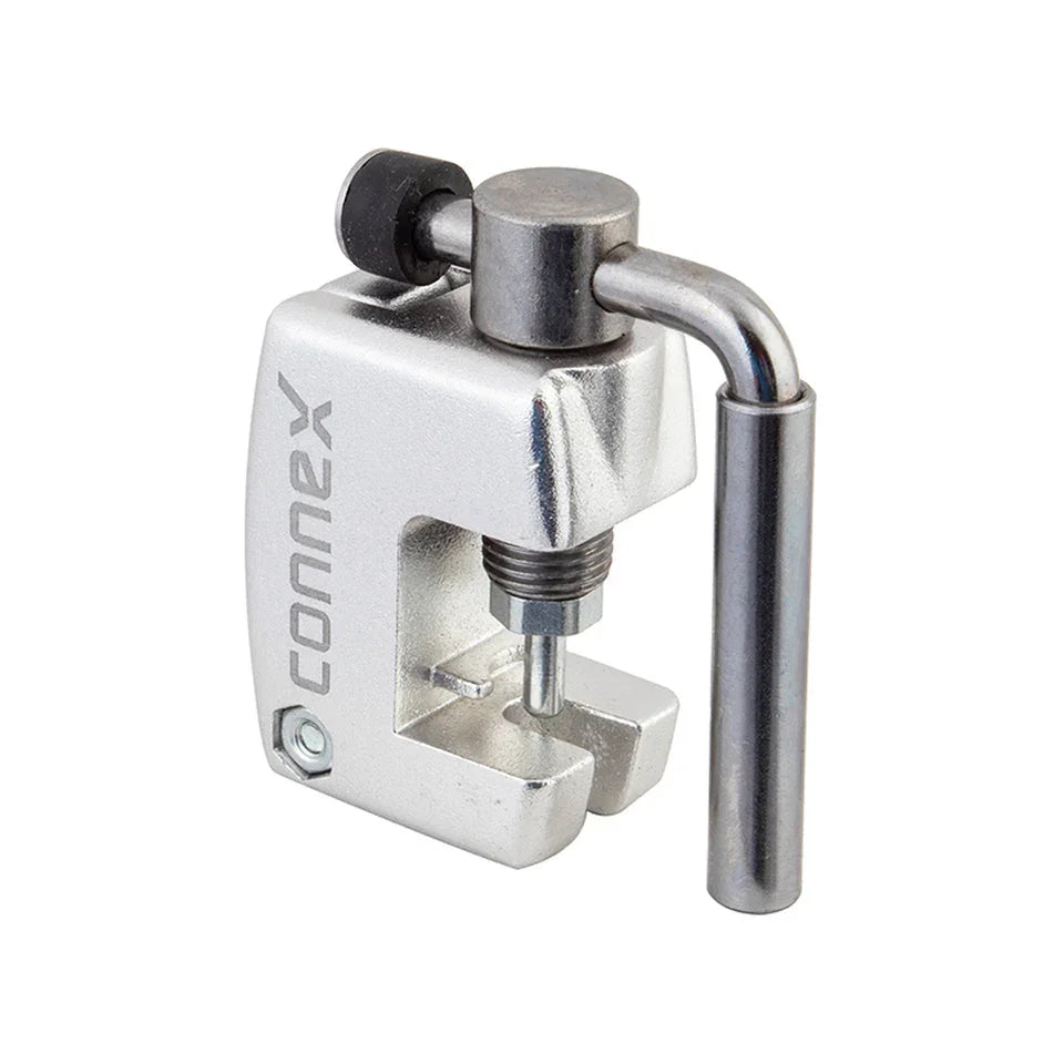 Connex bike chain tool metal chain breaker close-up on white background